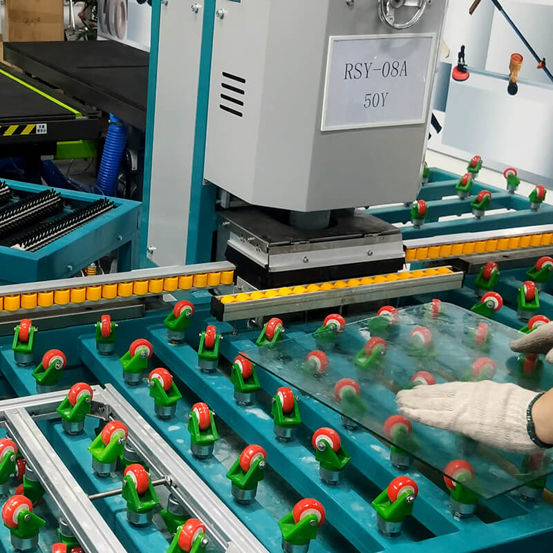 The Double Head Straight Glass Edging Machine is in operation. The Double Head Straight Glass Edging Machine is in operation.