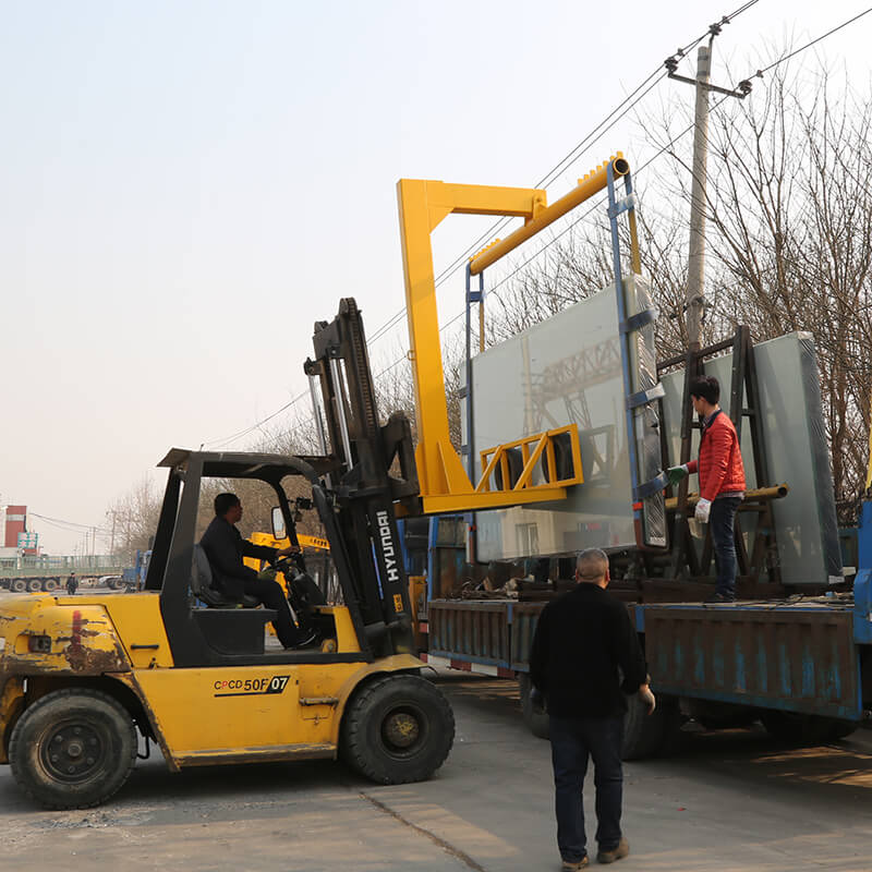 Forklift truck crane arm with base lifts the glass Forklift truck crane arm with base lifts the glass