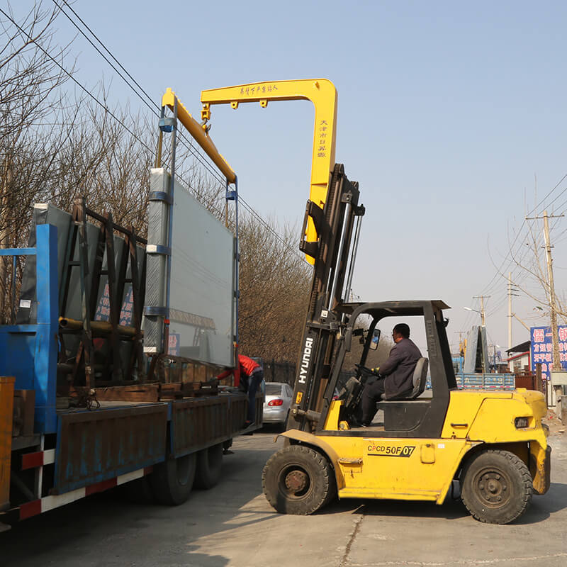 classic forklift truck crane arm lifts the glass classic forklift truck crane arm lifts the glass
